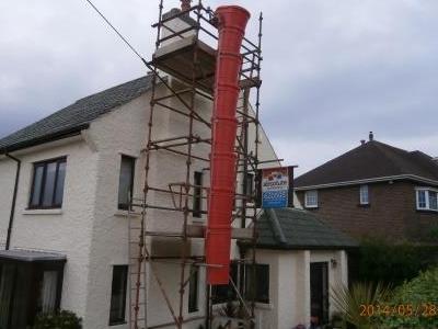 Scaffold with rubble chute